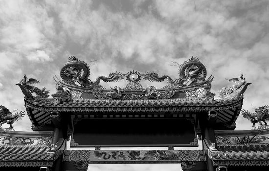 Black and white dragon statue in the temple.