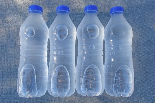 close up plastic water bottles