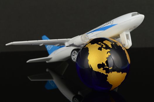 A conceptual image of an airplane traveling the whole world.