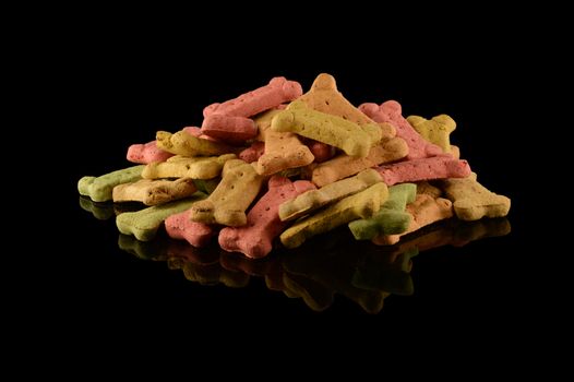 A heaping pile of various dog treats for the friendly pet you love.