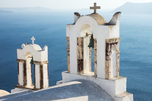 Two small belltowers seen in Oia, Santorini