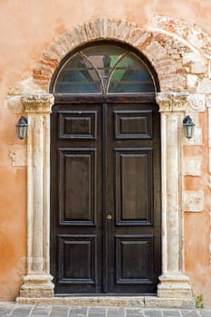 A beautiful wooden church door in Chania on Crete island