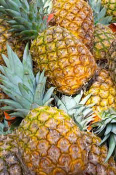 Fresh pineapples seen on a weekly fruit market