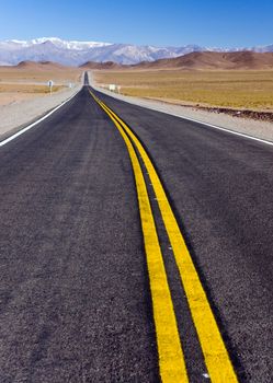 A road leading towards the mountains in northern Argentina