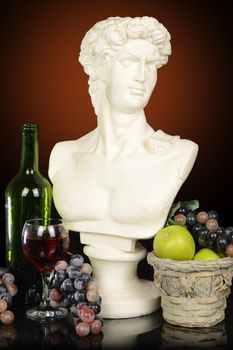 A Roman Head Bust of a man surrounded by fruits and wine with a gradient background.