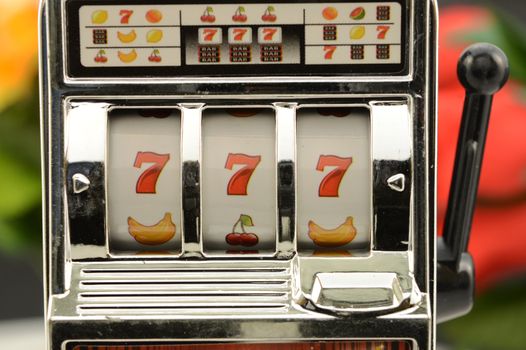 A closeup view of a lucky jackpot winner on the slot machine.