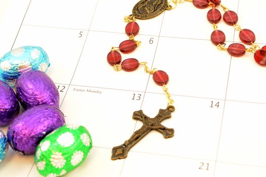 Easter Monday is marked on the calendar with a rosary and some chocolate eggs for the holiday season.
