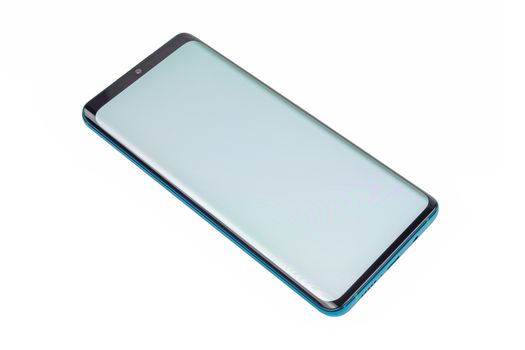 Generic green 2020 year smartphone with waterfall display and teardrop front camera - showng blank white screen with pixel grid. Isolated on white background in diagonal perspective.