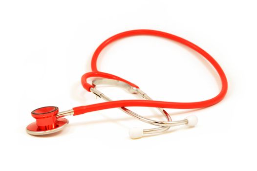 An isolated red stethoscope for use as a graphic element in medical designs.