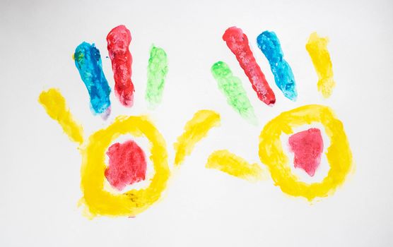 multicolored prints of hands, children's creativity, drawing.