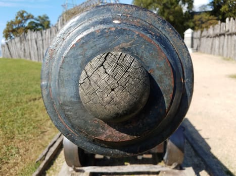 iron metal cannon weapon plugged with wood sphere