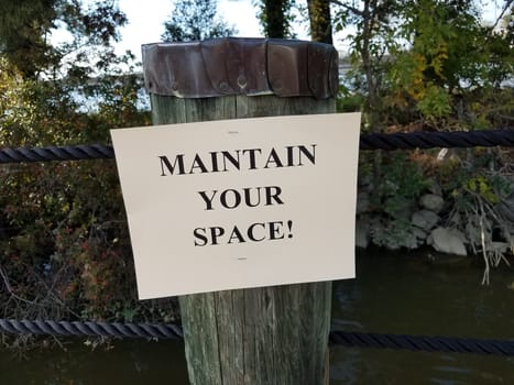 maintain your space sign on wood column or post