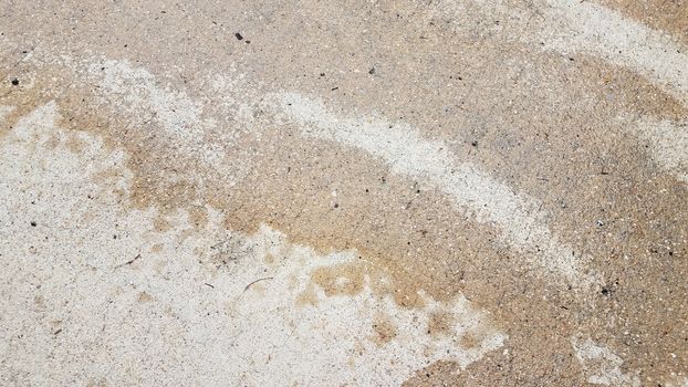 water on wet grey cement pavement or ground