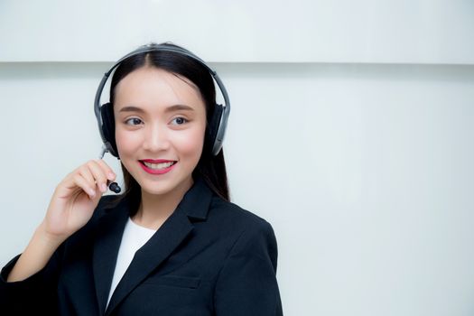 Beautiful asian woman smiling customer service talking on headset. Business concept.