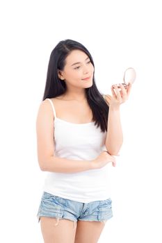 Portrait of beautiful asian woman applying powder puff at cheek makeup of cosmetic, beauty of girl with face smile isolated on white background, wellness and healthcare concept.