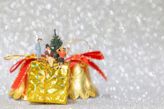 Miniature people, Happy family celebrating A Christmas  , Christmas and Happy New Year concept.