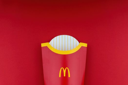 Kuala Lumpur, Malaysia - October 20, 2020 : McDonalds french fries box on red background