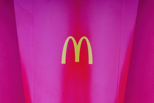 Kuala Lumpur, Malaysia - October 20, 2020 : McDonalds french fries box on red background