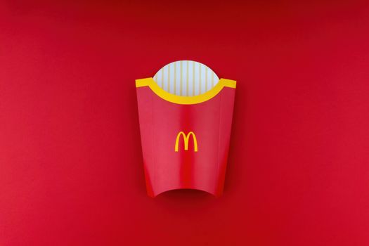 Kuala Lumpur, Malaysia - October 20, 2020 : McDonalds french fries box on red background