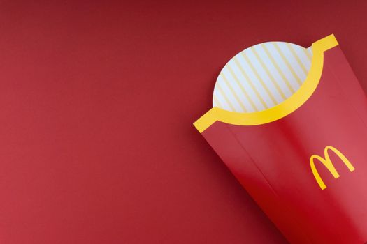 Kuala Lumpur, Malaysia - October 20, 2020 : McDonalds french fries box on red background