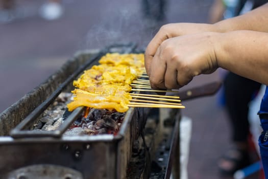 Pork Satay roast on the stove heat thai street food Bangkok Thailand
