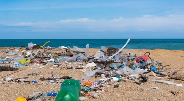 Plastic waste environment pollution on Mai Khao Beach, Phuket, Thailand.