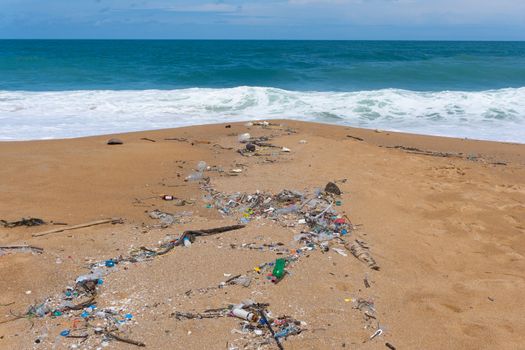 Plastic waste environment pollution on Mai Khao Beach, Phuket, Thailand.