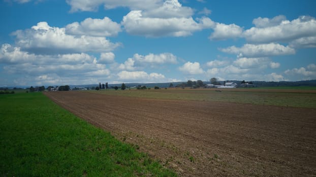 Steam Passenger Train Traveling Thru Countryside from Train Passenger View