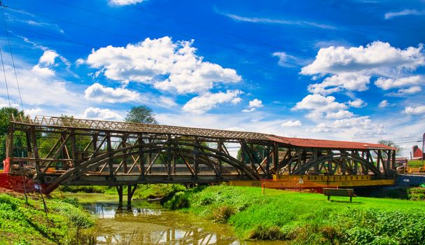 Old Pennsylvania Covered Dual Span Bridge being Disassembled with it's Timber Frame Exposed