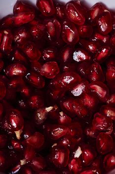 Pomegranate seeds close-up, Black background, macro photography