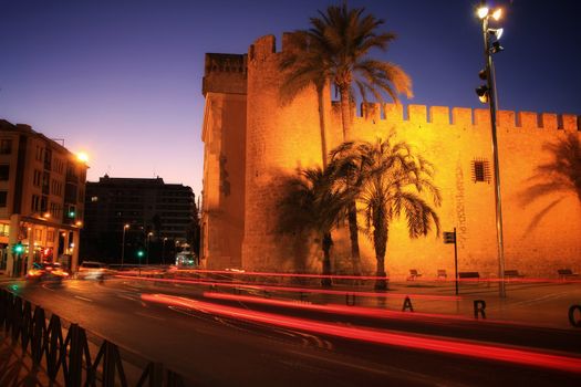 Elche, Alicante, Spain- October 28, 2020:Beautiful illuminated Altamira Palace and empty street at night in Elche, Alicante