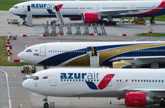 July 2, 2019, Moscow, Russia. Airplanes Boeing 767-300 Azur Air airline and Airbus A330-300 I Fly Airlines at Vnukovo airport in Moscow.