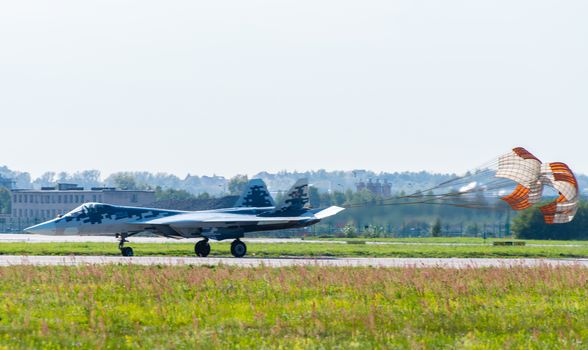 August 30, 2019. Zhukovsky, Russia. fifth-generation promising Russian multi-functional fighter Sukhoi Su-57 with a released parachute at the International Aviation and Space Salon MAKS 2019.