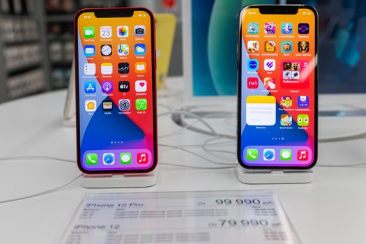 October 23, 2020, Moscow, Russia. New smartphones from the Apple Iphone 12 and Iphone 12 pro on the store counter.