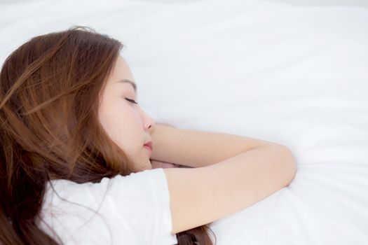Portrait of beautiful asian young woman sleep lying in bed with head on pillow comfortable and happy with leisure, girl with relax  for health and lifestyle concept, top view.