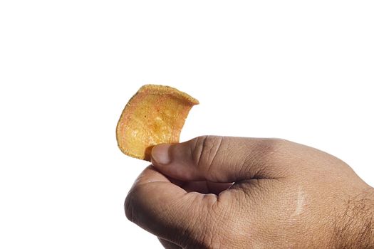 Male hand with snack on white background