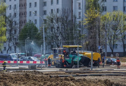 Belarus, Minsk - 06.05.2017: Special equipment for laying asphalt on the construction of a new road