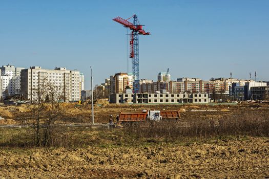 Belarus, Minsk - 20.04.2017: Tower crane on the construction of a multistory apartment building