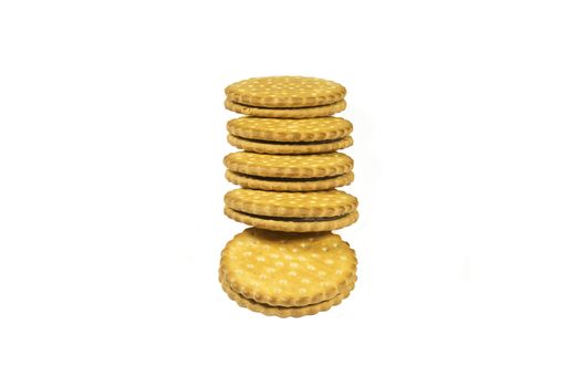 Round biscuits with chocolate filling on a light background