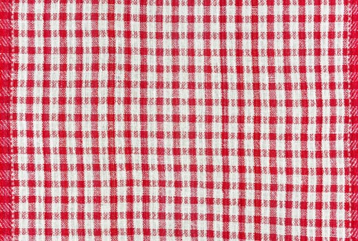 Texture of cotton fabric with a pattern in a box of red color