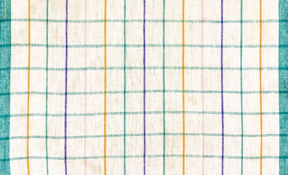 Texture of cotton fabric with vertical and horizontal stripes of different colors