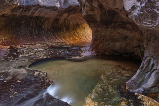 Beautiful patterns of light and shadow in The Subway, a famous slot canyon in the Left Fork North Creek, Zion National Park.