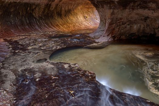 Beautiful patterns of light and shadow in The Subway, a famous slot canyon in the Left Fork North Creek, Zion National Park.