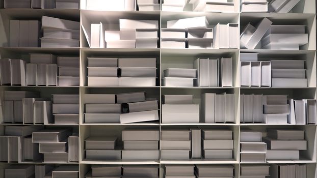 Realistic white color book shelf stack mock up for decoration in reading room which every book designed and made from hardcover paper and align on the wall and represent modern interior design