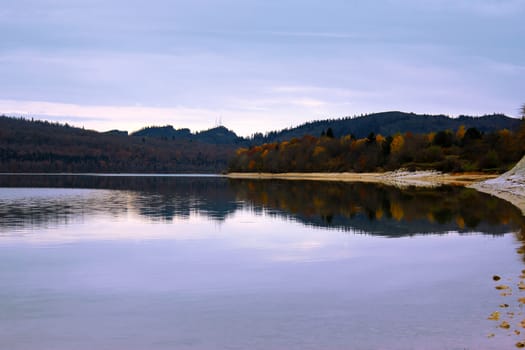 Shaori lake in Racha, Georgia. Lake landscape at autumn time.