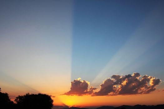 Mountain cloudscape and landscape at sunset in Georgia. Horizon in mountain range.cloudy vivid sunlight, fire storm cloudy view.