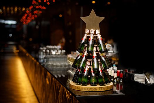 24.12.19 - Minsk, Belarus: Champagne bottles "Moet" in the form of a Christmas tree