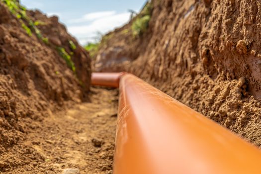Plastic pipes in the ground during the construction of a building