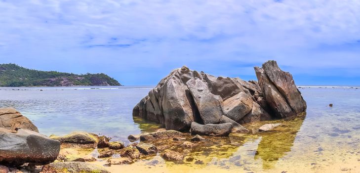 Stunning high resolution beach panorama taken on the paradise islands Seychelles.