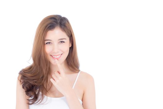 Portrait of beautiful asian woman makeup of cosmetic, girl hand touch mouth and smile attractive, lips beauty perfect with wellness isolated on white background with healthcare concept.